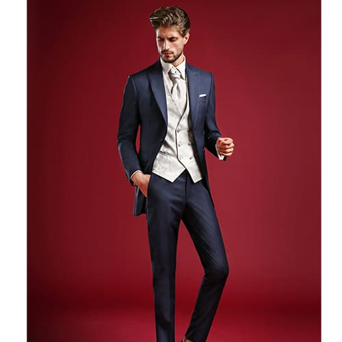 abito lungo blu con gilet damascato bianco maestrami cerimonia